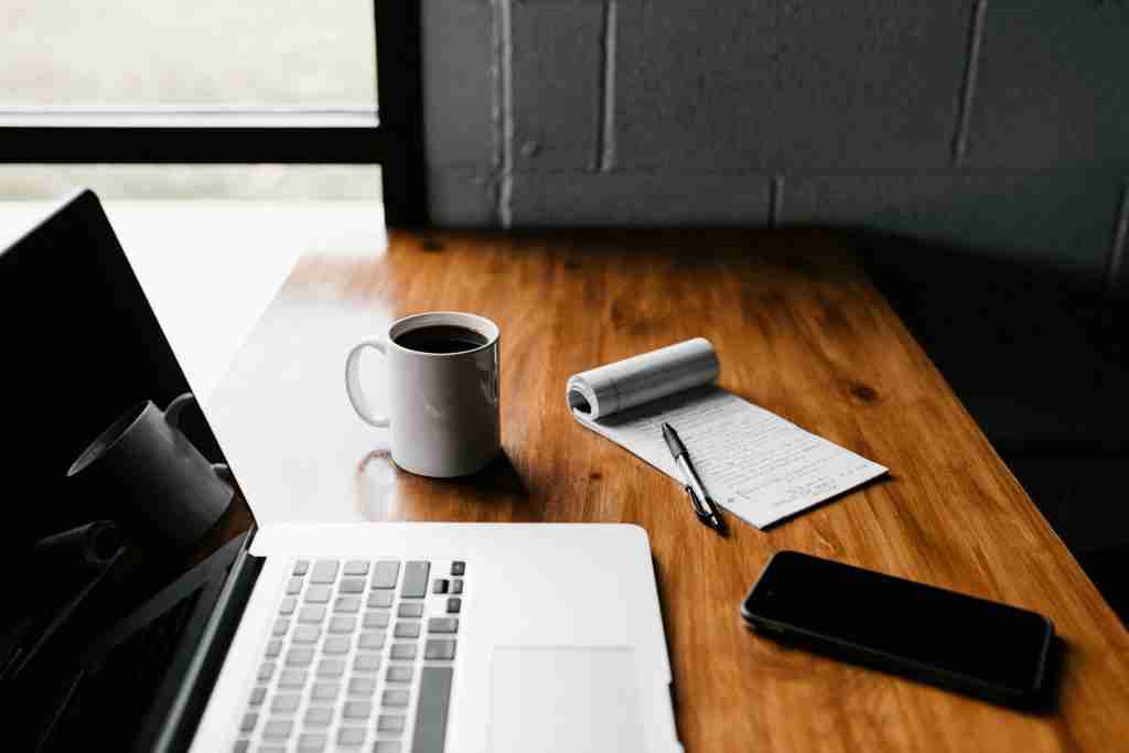 Page Rank Study on a laptop and a cup of coffee on a table
